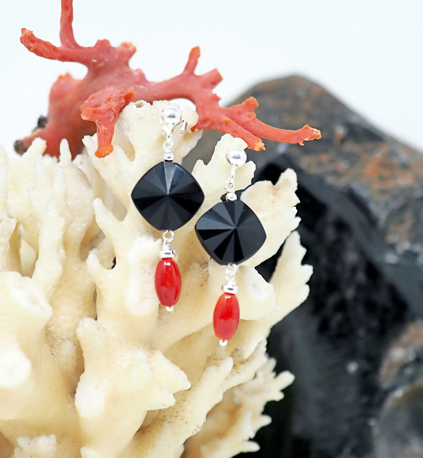 Faceted obsidian and coral earrings